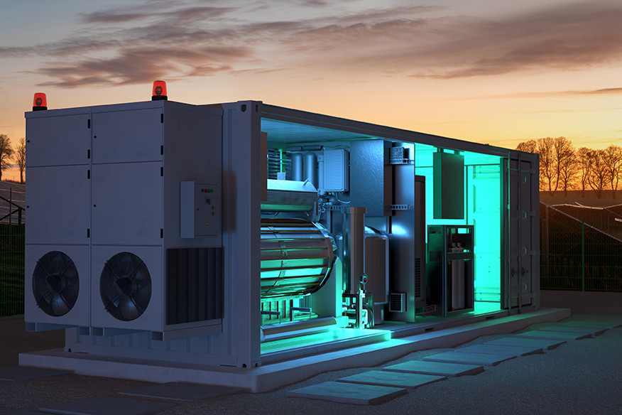 Container mit Elektrolyseur schräg von vorn in der Abenddämmerung aufgenommen